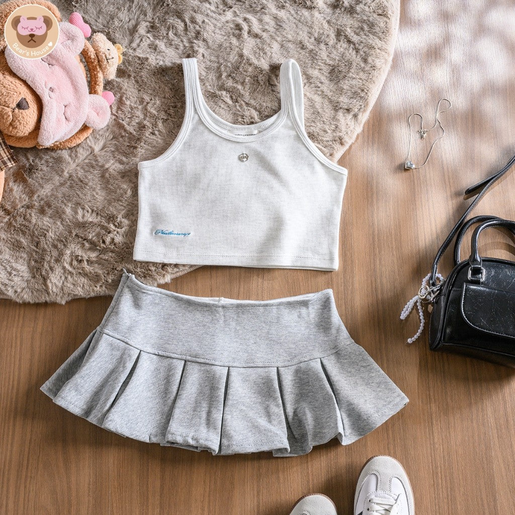 Pup up Tank Top เสื้อกล้ามสีพื้น ครอป ดีเทลติดอะไหล่เงิน ปลายเสื้อปักโลโก้ ผ้าร่องยืดหยุ่น